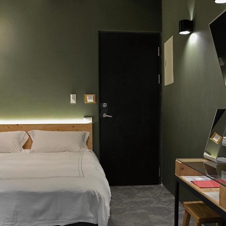 Si Hotel Тайджун Екстериор снимка