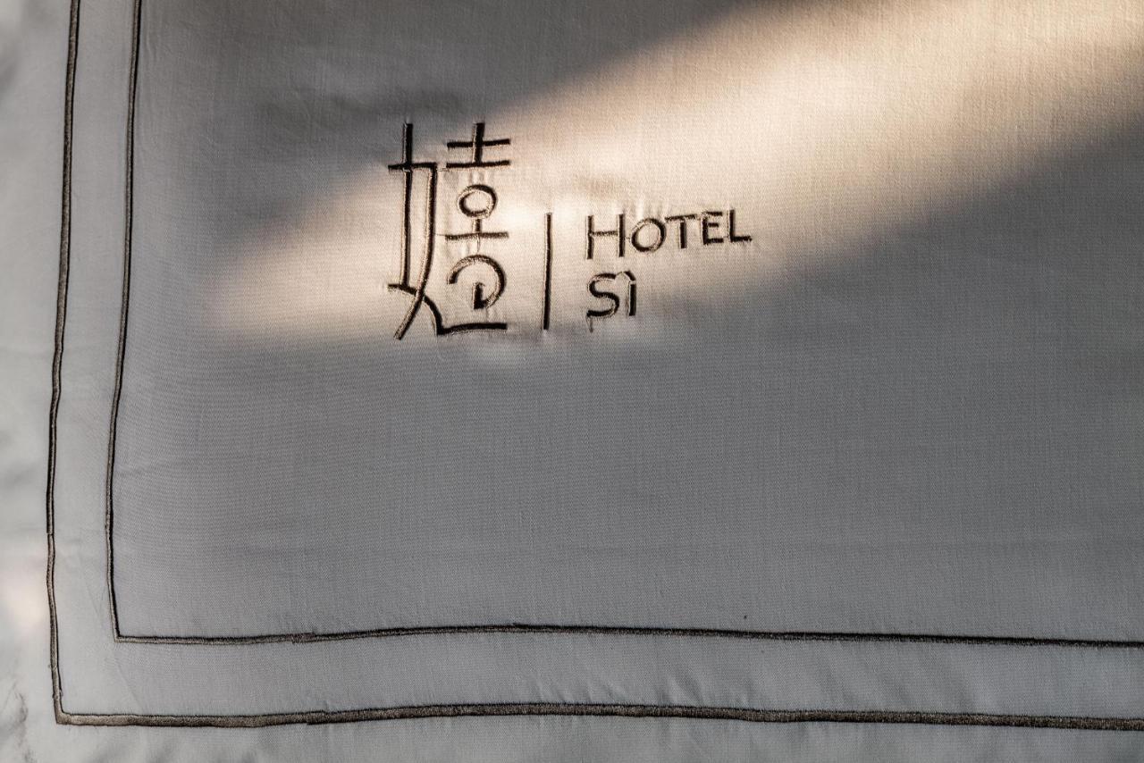 Si Hotel Тайджун Екстериор снимка